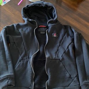 Boys size medium Jordan black zip up hoodie